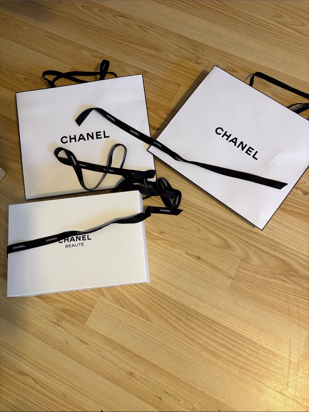 Chanel shopping bags and ribbon